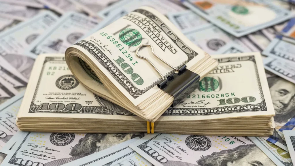 Dólar retoma queda a R$ 5,86 com valorização de pares emergentes